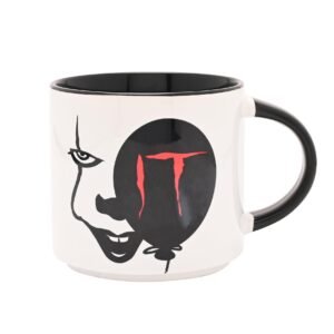 Warner Bros IT - Taza de cerámica negra de 415 ml, diseño de cara de